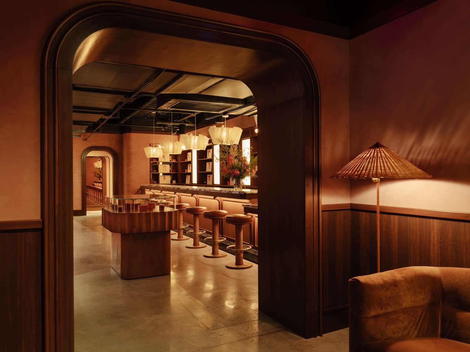 Charlie Fox: a wide timber arch, and a lit arched alcove