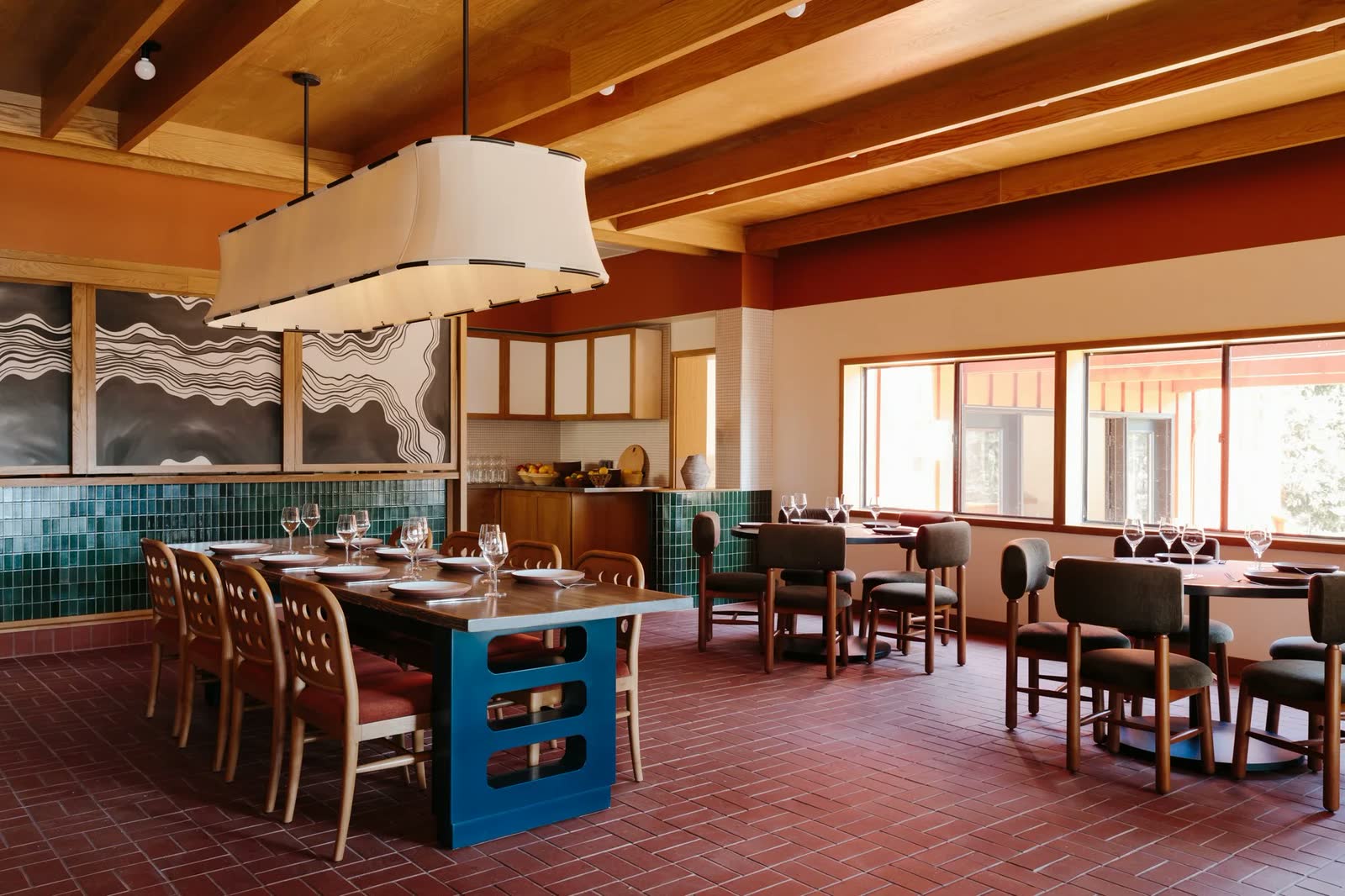 The Lodge at Marconi: the dining hall, and a doorway onto a red dining room